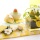 Tischdeko für Ostern mit Wollband Happy in den beliebten Frühlingsfarben gelb weiß zum selber machen