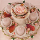 Rosenstrauß mit Wollvlies als Tischdeko für Hochzeit und Feste in rosa weiß