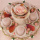 Rosenstrauß mit Wollvlies als Tischdeko für Hochzeit und Feste in rosa weiß