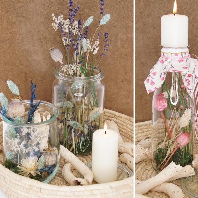 Glasvasen mit Trockenblumen dekorieren bunte Tischdeko