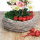 DIY Grabgesteck in Pflanzschale aus Rebe geweißt mit Christrosen, Trockenblumen und Herz